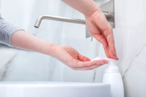 woman-washing-hands-with-foam-soap-hygiene-YNWDVXN-scaled-300x200 Front Page